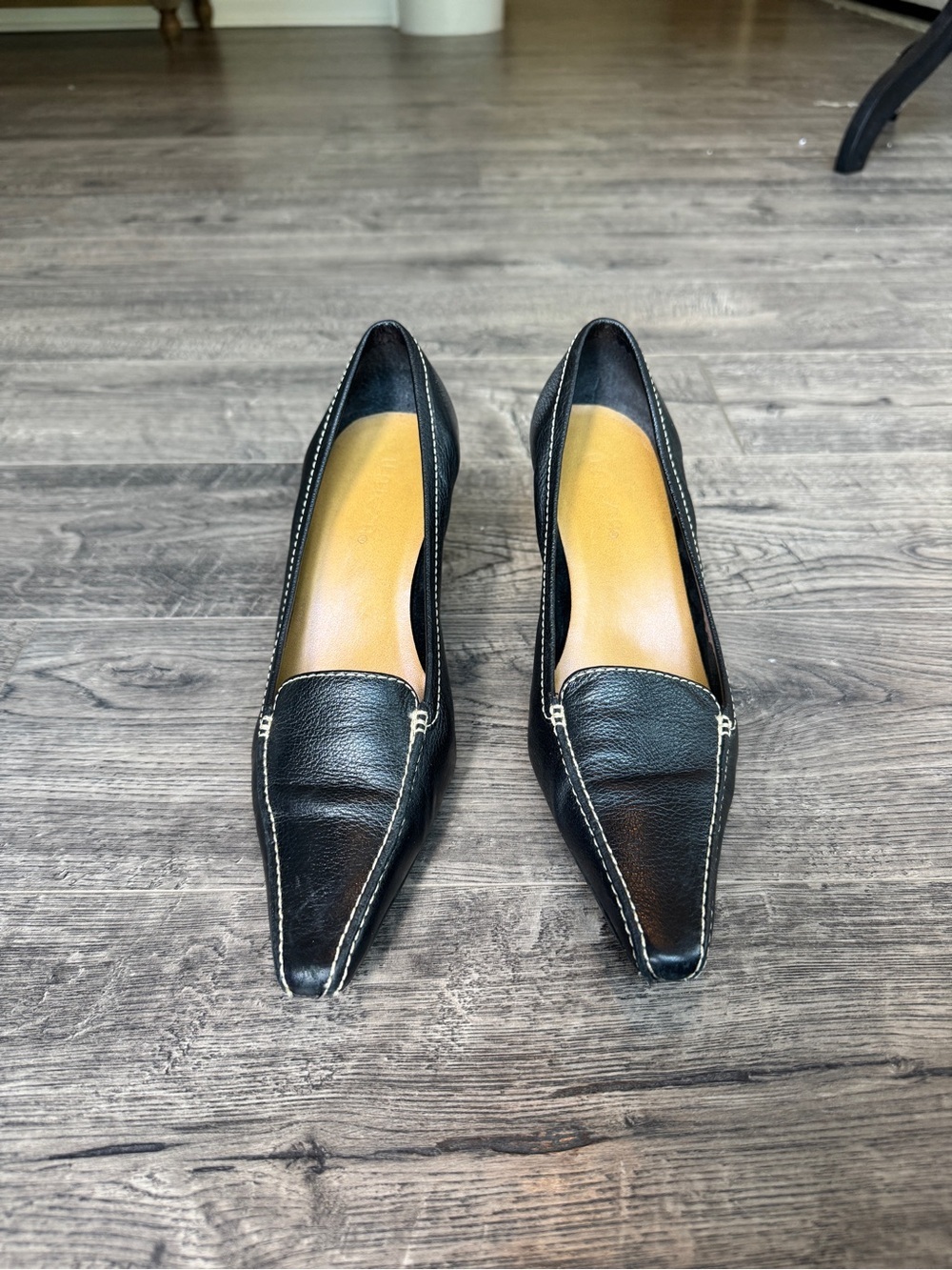 Unisa Black Pointed Toe Leather Mules with Contrast Stitching